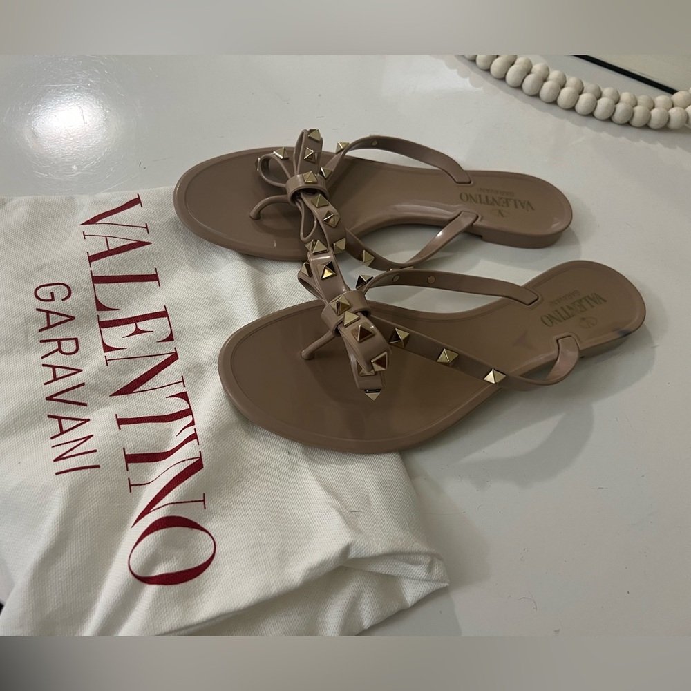 One of the sandals has a stain.
